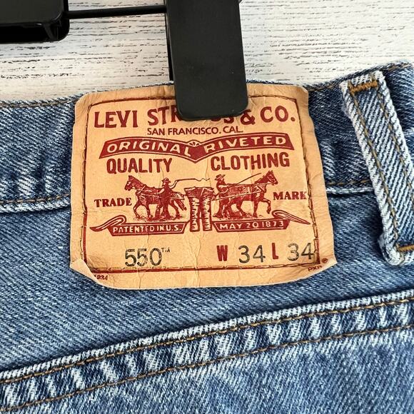 Levi's Relaxed Fit 550 Tapered Leg Medium Wash Jeans Size 34 - Picture 8 of 10